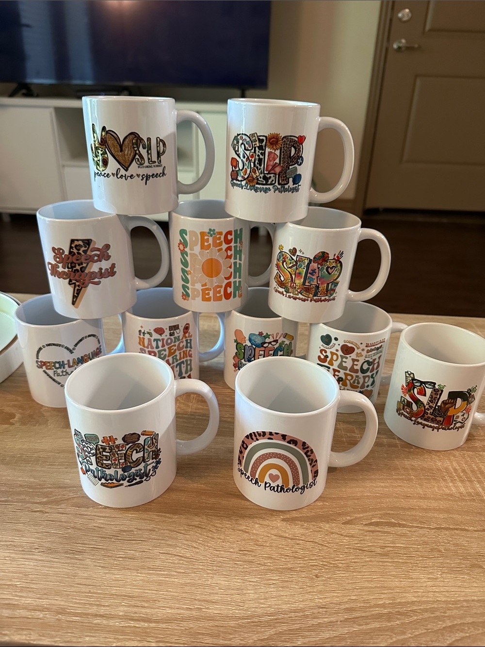 Set of 12 ceramic mugs - Assorted speech therapy designs